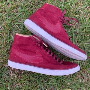 Red suede Nike high tops